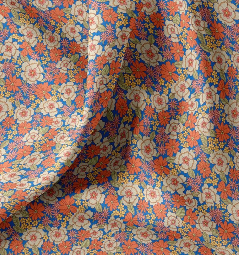 Baumwolle bedruckt Blumen orange auf blau *Ab 50cm