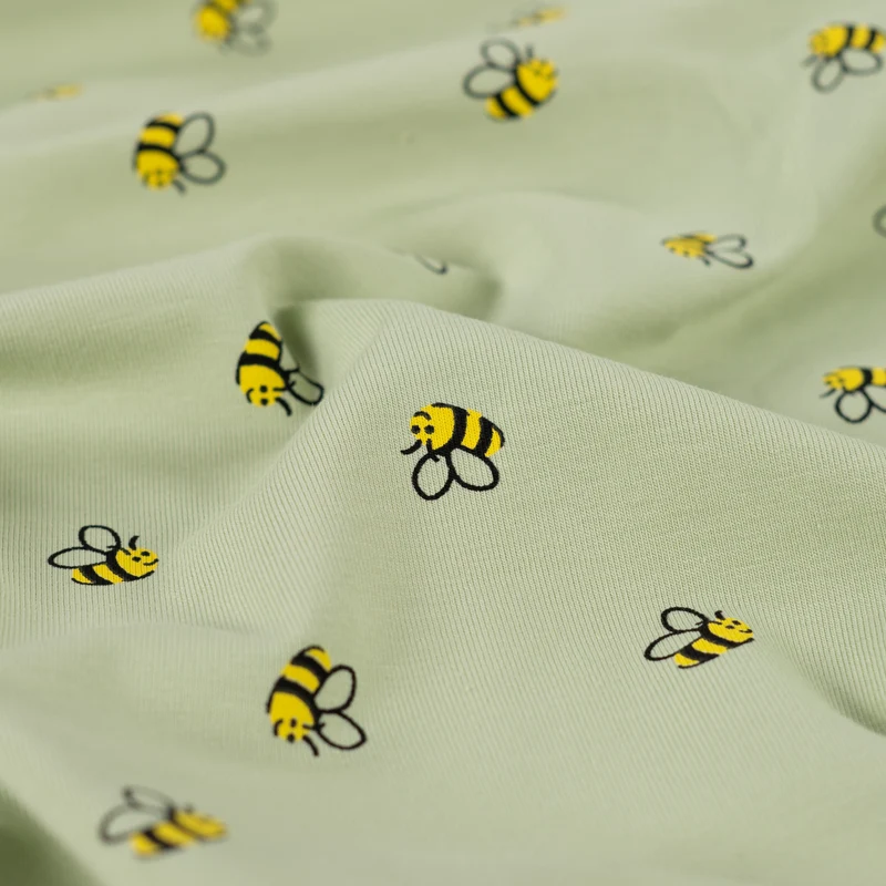 Baumwolljersey Bienen hellgrün * Ab 50 cm