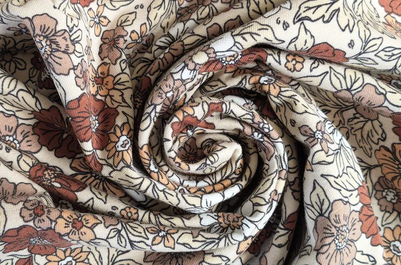 Baumwolljersey Blumen beige *Ab 50cm