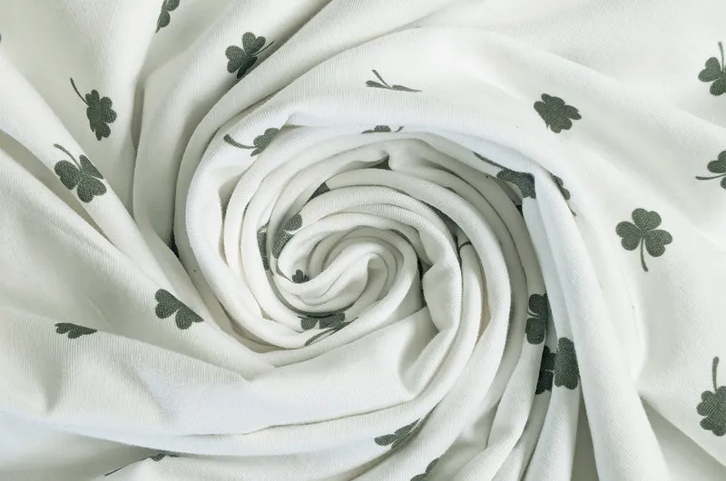Baumwolljersey Kleeblätter creme *Ab 50cm