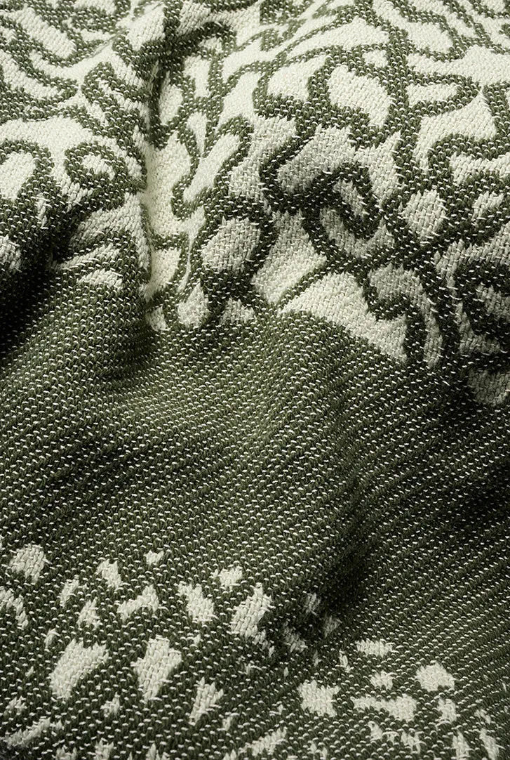 Cotton Blanket “Merging Islands” in Tea Green by Roland Schär