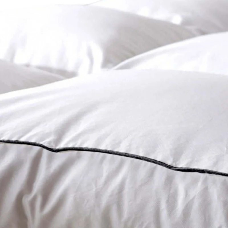 Surmatelas 100% plumes de canard, moelleux et ergonomique - Collection Plumes XXL